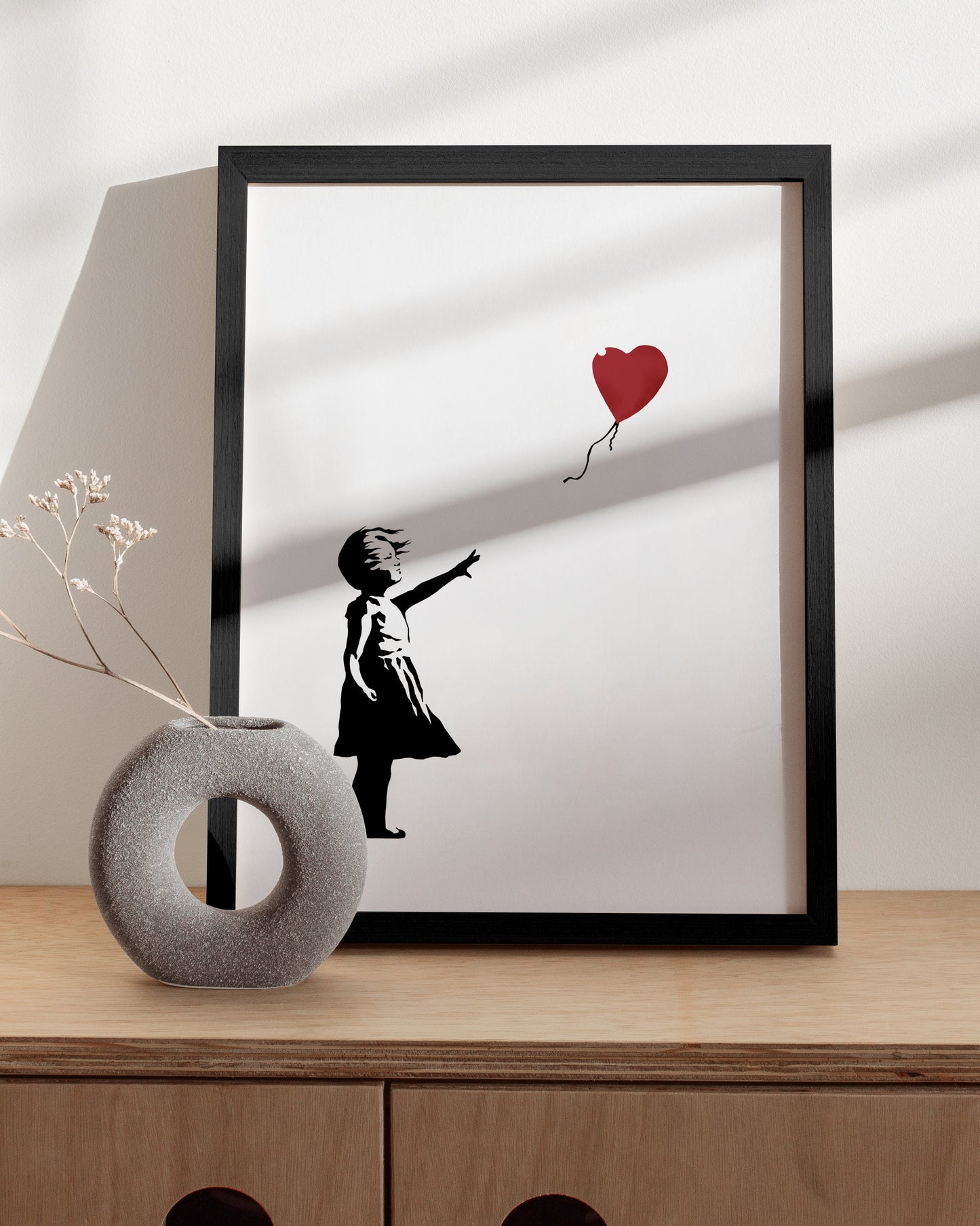 Banksy girl with balloon