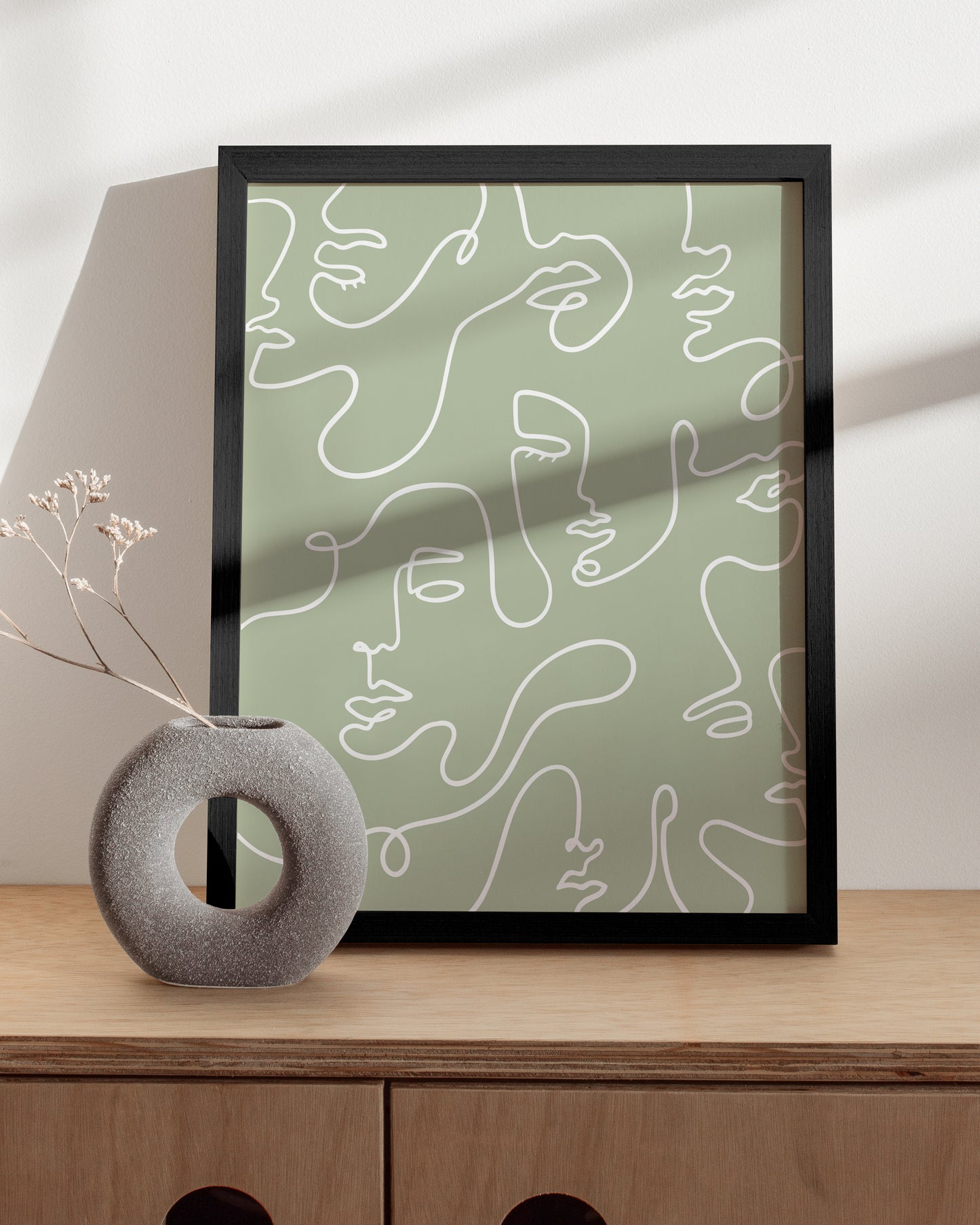 Green abstract faces